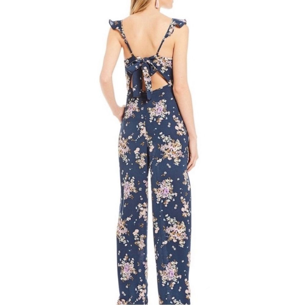 Gianni Bini floral jumpsuit navy blue purple open back ruffle size medium